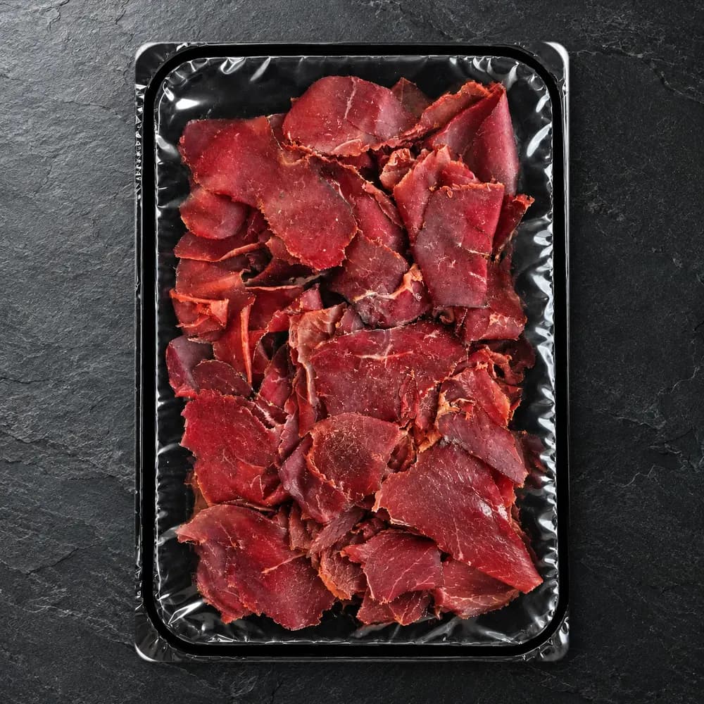 Viande séchée de bœuf du Fumoir de Champoz, en barquette.