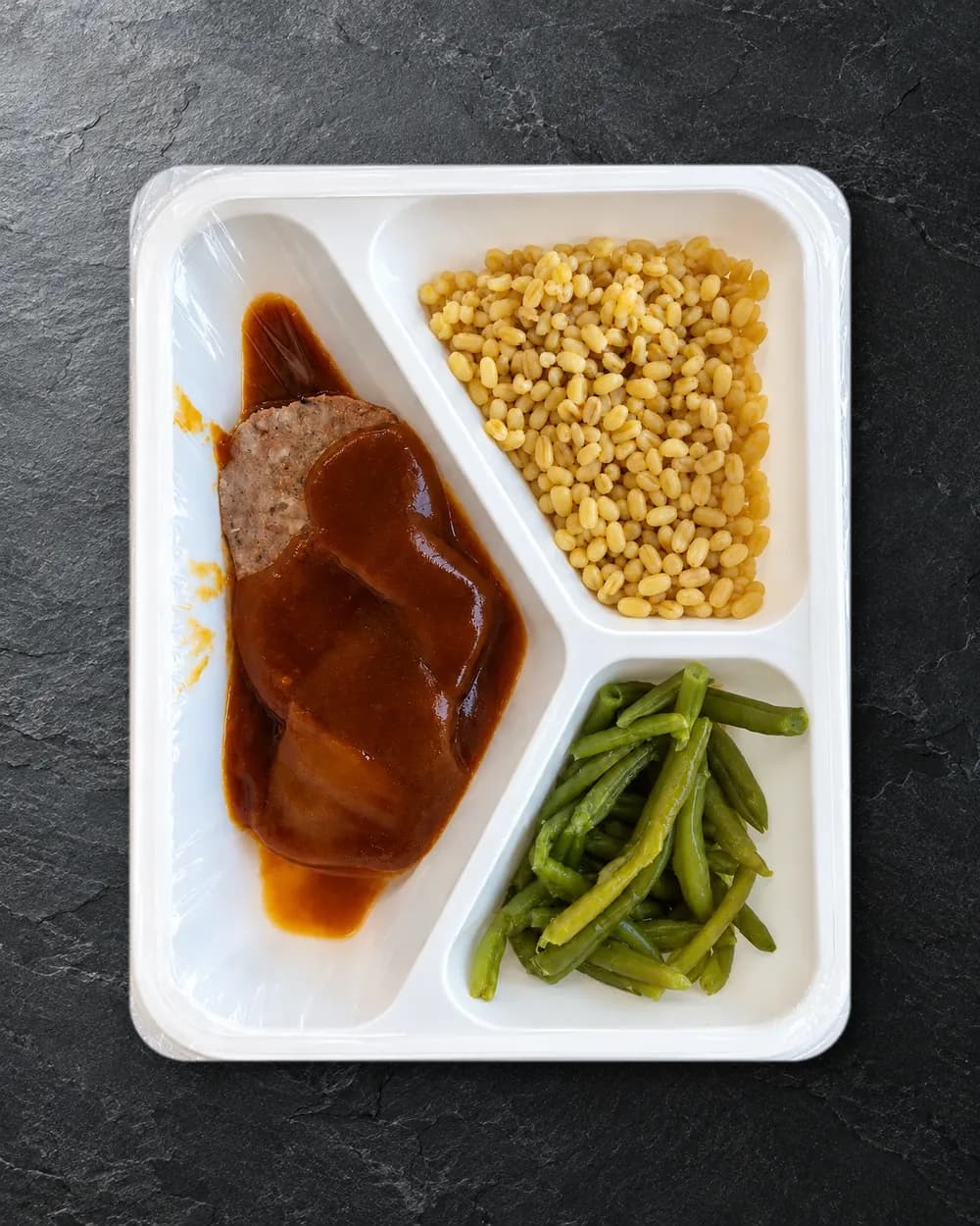 Rôti haché de porc et bœuf, plat préparé du Fumoir de Champoz.